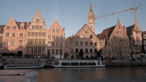Camera rises jib style over Leie Canal and Graslei in Ghent, Belgium. Stock Footage 90332190