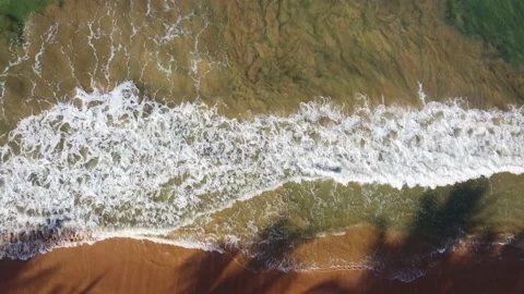 The camera rises from the ocean view Stock Footage 234049872