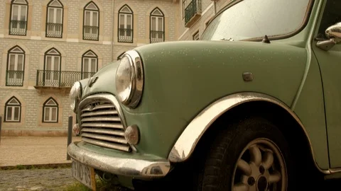 Camera rises from old style mini to tiled building in Alabama district, Lisbon Stock Footage 116170496