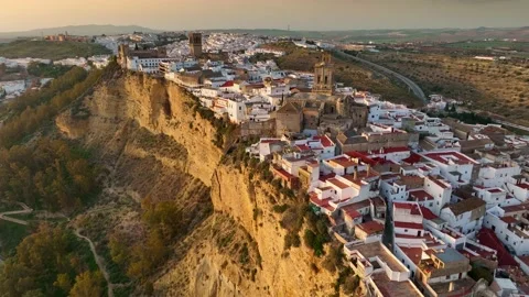 Camera rises over Arcos de la Frontera, Andalucia, Spain at sunset. Aerial shot Video stock 176258286