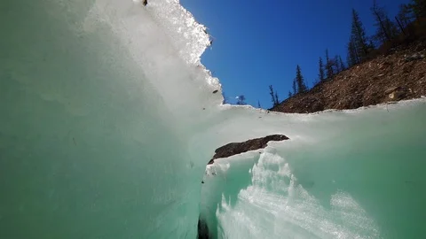Camera rising above the ice crack. Stock Footage 90768780