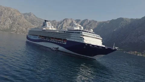 Camera Roll Around Cruise Ship in Scenic Bay Stock Footage 326499567
