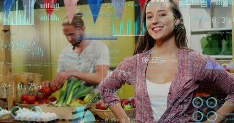 Camera rolling, woman shifting pose and man arranging tomatoes for market, Stock Footage 334036746