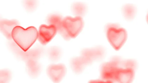 The camera rotates around an array of hearts. Focusing and defocusing on three Stock Footage 95579058