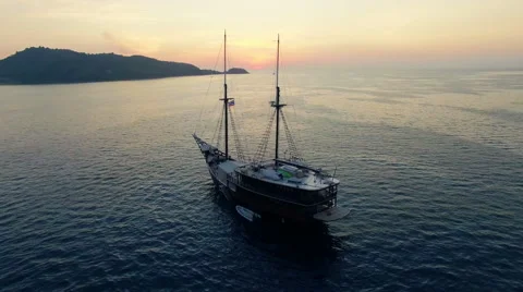 Camera rotates around a sailing ship in the sea. Aerial made with drone N. Stock Footage 63388276