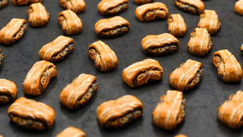 Camera rotates over a variety of chocolate buns Stock Footage 105466489