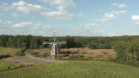 Camera rotating around a big dutch windmill Stock Footage 293158391