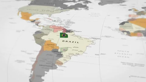 The camera rotating around Brazil on the world map takes the focus. Video stock 299937604
