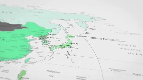 The camera rotating around japon on the world map takes the focus. Video stock 299942174