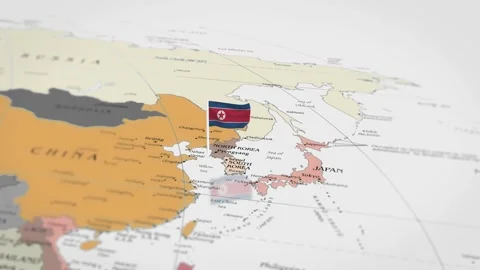 The camera rotating around North Korea on the world map takes the focus. Stock Footage 299942441
