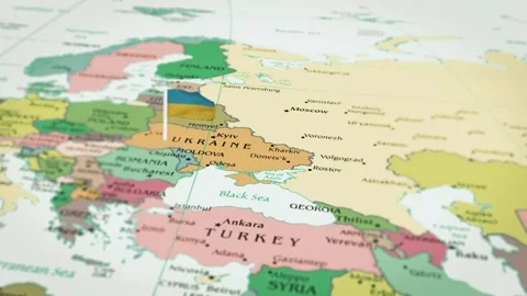 The camera rotating around Ukrainian, on the world map takes the focus. Stock Footage 296826487