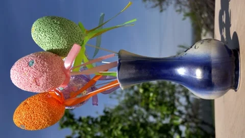 Camera rotation around decorative Easter eggs in a vase against Stock Footage 195182287