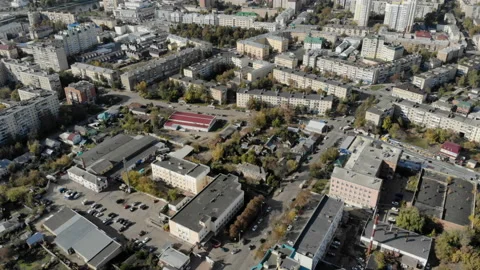The camera scans the city blocks. Stock Footage 96333301