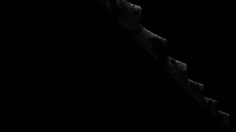 The camera scans the monstrous saw made of stone from bottom to top against a Stock Footage 149199283