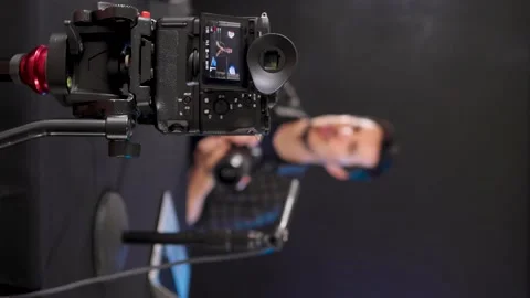 Camera screen recording young man's video tutorial for vlog in vertical 動画素材 234542843