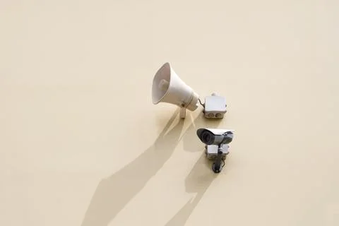 Camera security system and loudspeaker on the wall Stock Photos
