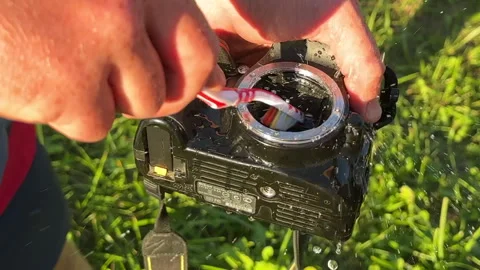 Camera sensor cleaning (CCD or Cmos). Cleaning photocamera Video stock 265910239