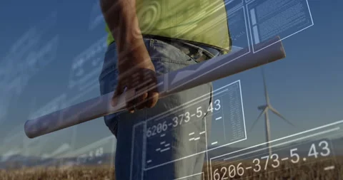 Camera settling on engineer holding plans at turbine, panels sliding updating Video stock 309893769