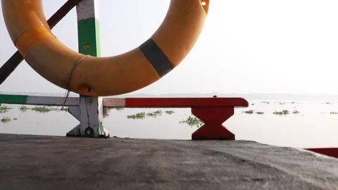 Camera shakes while stationed on top of an Indian boat on the Ichamati River Stock Footage 170414992