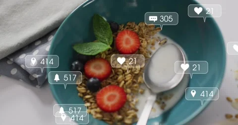 Camera sharpening, notification badges multiplying over teal bowl and spoon, Video stock 333829751