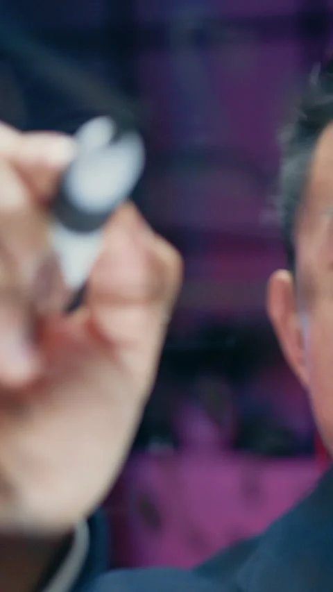 Camera shooting on good-looking thoughtful successful skilled 40-aged asian male Stock Footage 327221825