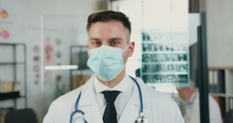 Camera shooting on likable confident qualified successful adult medic in Stock Footage 160472281