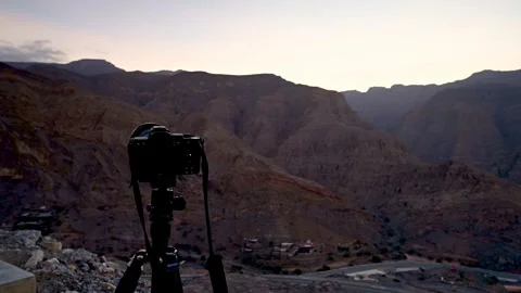 Camera shooting timelapse in Jebel Al Jais Sunrise Stock Footage 257793673