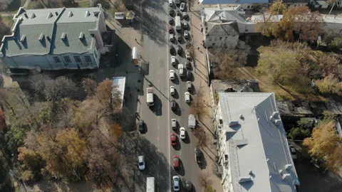 The camera shows a city traffic jam, and then takes the city in the general plan Stock Footage 101012179