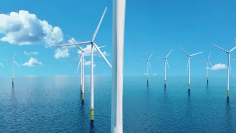 The camera shows a wind farm at close range. Stock Footage 257896997