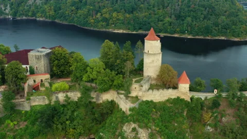 Camera side moving along Zvikov Castle on the hill surrounded by river Vltava Stock Footage 232545425