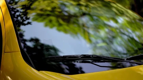 Camera slide on a front yellow car Stock Footage 130060313