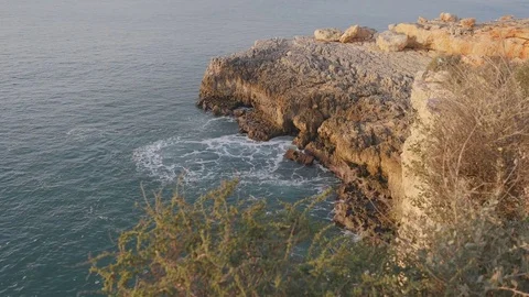 Camera slide over cliffs in Portimão, Portugal Stock Footage 80119602