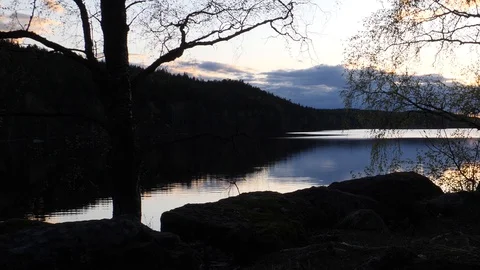 Camera slide over lake view in night Stock Footage 129653561