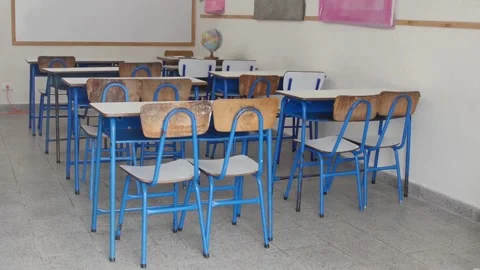 Camera slide showing empty school classroom with interactive whiteboard no Stock Footage 256720247