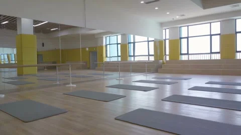Camera slide showing empty school classroom with interactive ballet dance roo Stock Footage 256720720