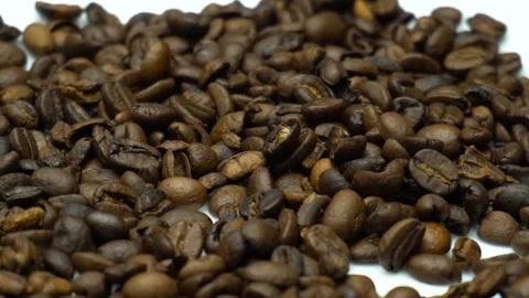 Camera slides above coffee beans on the white plate. Stock Footage 86214901