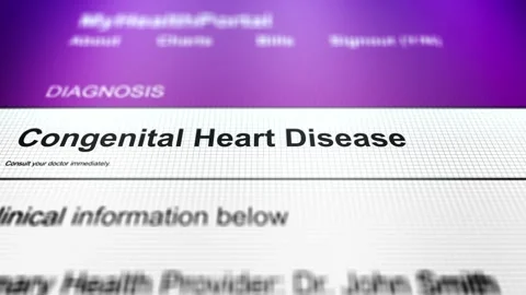 Camera Slides Across Generic Health Portal with Congenital Heart Disease Dia Vídeos de archivo 337889689