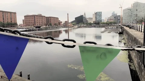Camera slides along Salthouse Dock, Mann Island on the background in Liverpool Stock Footage 99735937