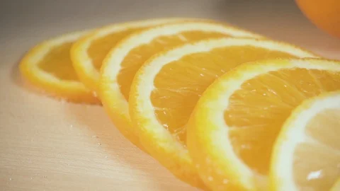 The camera slides on orange slices slow motion Video stock 88050338