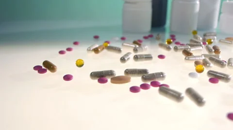 Camera slides over drug on table Vidéo 65940272