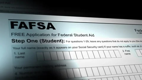 Camera slides over a FAFSA form - V2 Stock Footage 266693312