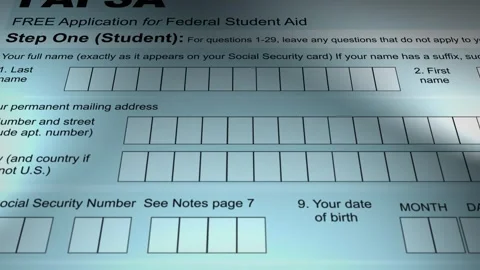 Camera slides over a FAFSA form - V3 Stock Footage 266693313