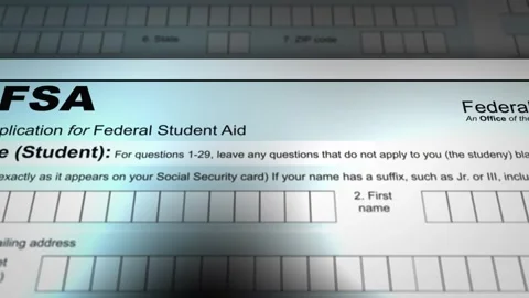 Camera slides over a FAFSA form - V1 Stock Footage 266693334