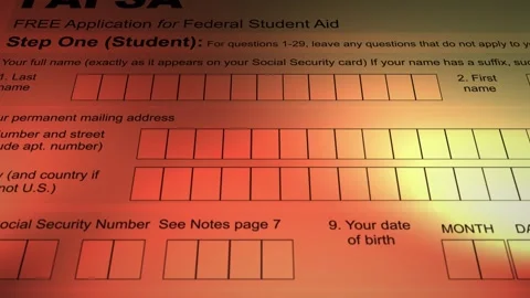 Camera slides over a FAFSA form - V6 - Ominous Lighting Stock Footage 266693369