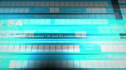 Camera slides over a FAFSA form - V7 - Online Form Stock Footage 266693375
