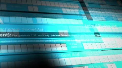 Camera slides over a FAFSA form - V8 - Online Form Stock Footage 266693377