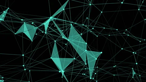 The camera slides up the transforming structure.Abstract futuristic, polygonal Stock Footage 95296513