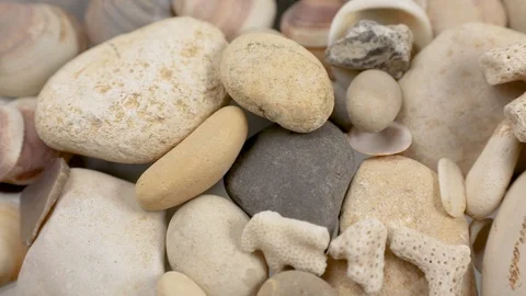 Camera sliding slow over sea pebble Stock Footage 125330637