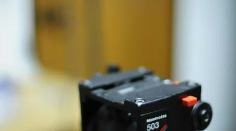 Camera Sliding onto Tripod Stock Footage 541279