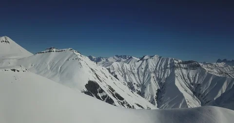 The camera slowly floats away and offers a beautiful view of the mountains Stock Footage 93386237